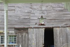 Hummer-in-flight-barn-background